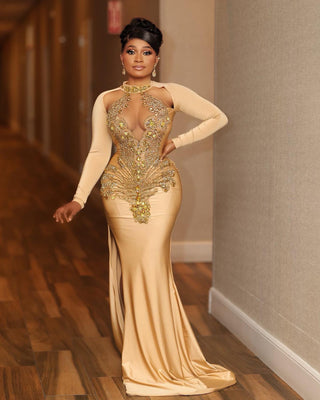 Luxurious Long Sleeve Sheer Bodice Gown with Gold Embellishments