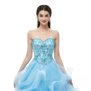 Enchanting Strapless Ball Gown with Beaded Bodice and Voluminous Ruffle Skirt