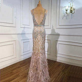 Elegant Nude Pink Mermaid Evening Dress - High Split, Luxury Feathers, and Beaded Details for Women's Party 2024