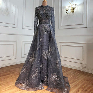 Dubai Azure Twilight: Luxury Blue Muslim Evening Dress with Overskirt and Long Sleeves, Exhibiting Elegant Arabic-inspired Design, Ideal for Weddings and Formal Occasions.