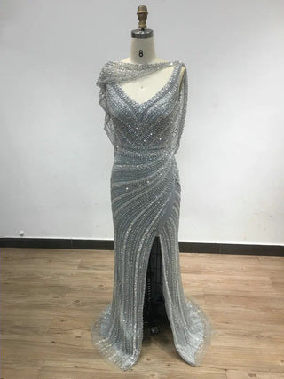 Ships in 1 to 3 Days - Luxury Silver Mermaid Dubai Evening Dress with Cape: Heavy Beaded Detail, Slit Prom Dresses for Women at Wedding Parties