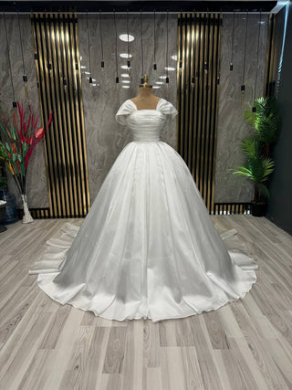 Celestial Radiance Bridal Gown: Elegant Off-Shoulder Design and Gleaming Accents