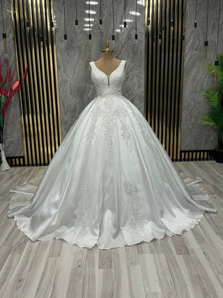 Luminous Elegance Bridal Gown with Plunge Neckline