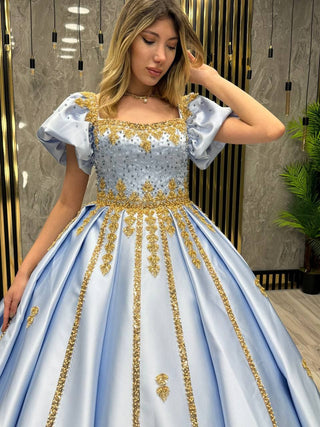 Celestial Blue Princess Gown with Golden Appliqué