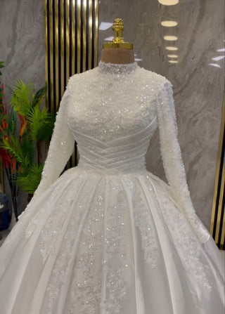 Radiant Pearl White Ball Gown with Sequin Embellished Bodice and Elegant Long Sleeves