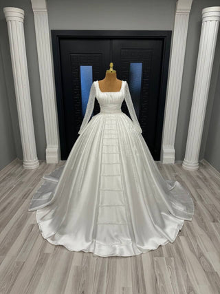 Imperial White Sequin-Adorned Ball Gown with Regal Long Sleeves