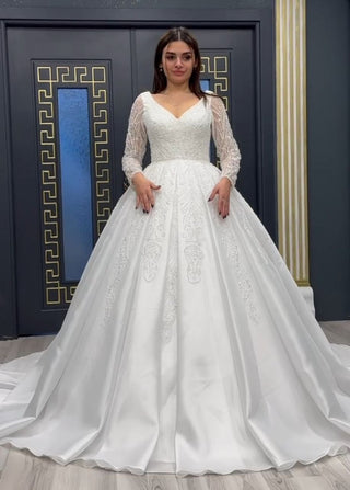 Luxurious Embroidered Princess Wedding Gown with Elegant Long Sleeves