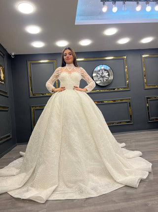 Opulent High-Neck Beaded Bridal Gown with Sheer Sleeves and Grand Train