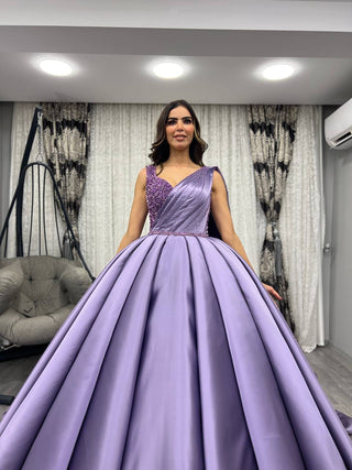 Opulent Ball Gown with Intricate Beaded Bodice and Floral Accents