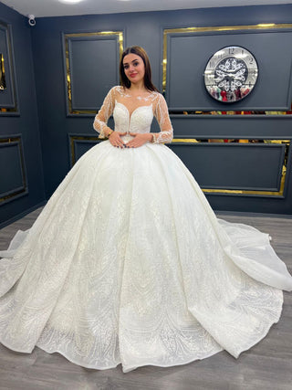 Enchanting Beaded Illusion Neckline Wedding Gown with Sheer Sleeves and Majestic Train