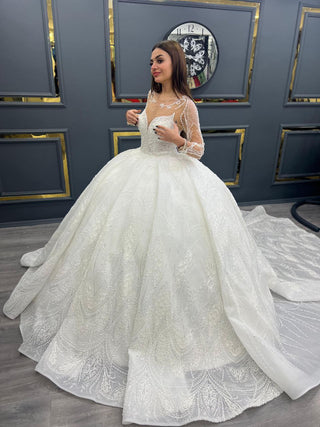 Enchanting Beaded Illusion Neckline Wedding Gown with Sheer Sleeves and Majestic Train