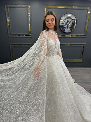 Divine Beaded Illusion Neckline Bridal Gown with Sheer Cape and Majestic Train