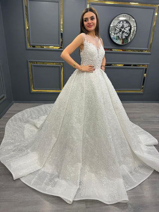 Divine Beaded Illusion Neckline Bridal Gown with Sheer Cape and Majestic Train