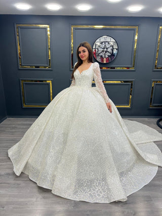 Glamorous Beaded Sweetheart Neckline Bridal Gown with Sheer Sleeves and Grand Train