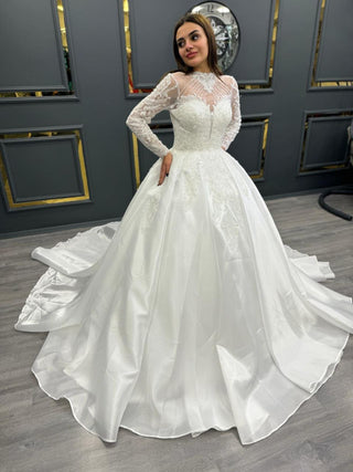 Graceful High-Neck Beaded Wedding Gown with Illusion Sleeves and Flowing Train