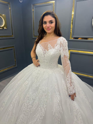 Opulent Grandeur: Exquisite Lace Embellished Bridal Ball Gown with Sheer Long Sleeves