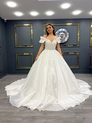 Charming Sweetheart Neckline Beaded Ball Gown with Ruffled Off-Shoulder Sleeves and Full Satin Skirt