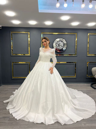 Ethereal Illusion Neckline Beaded Ball Gown with Long Lace Sleeves and Full Satin Skirt