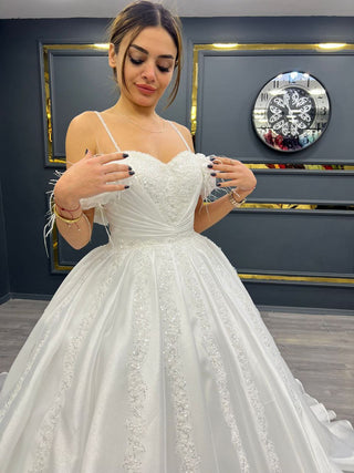 Luxurious Beaded Sweetheart Ball Gown with Feathered Off-Shoulder Straps