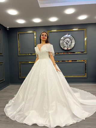 Exquisite Beaded Sweetheart Ball Gown with Draped Beaded Sleeves