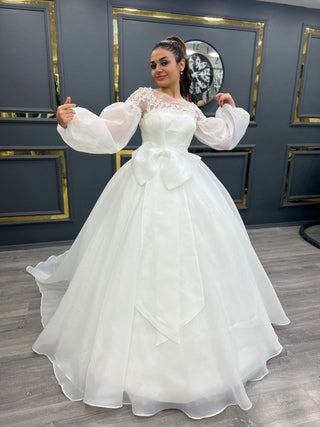 Exquisite Illusion Lace Bodice Ball Gown with Voluminous Bishop Sleeves and Satin Bow