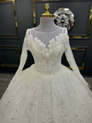 Grand Illusion Neckline Beaded Ball Gown with Long Sleeves and Floral Appliqué