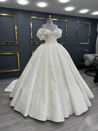 Opulent Beaded Ball Gown with Ruffled Off-Shoulder Sleeves and Intricate Embroidery