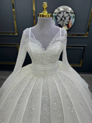 Magnificent Long-Sleeve Beaded Ball Gown with Sweetheart Neckline and Sparkling Embellishments