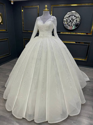 Magnificent Long-Sleeve Beaded Ball Gown with Sweetheart Neckline and Sparkling Embellishments