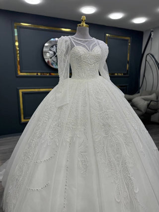 Opulent Illusion Neckline Beaded Ball Gown with Intricate Appliqué and Draped Sleeves