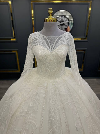 Elegant Beaded Illusion Neckline Ball Gown with Lace Appliqué and Flowing Sleeves