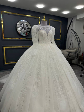 Opulent Illusion Neckline Gown with Intricate Beading and Majestic Full Skirt With puff sleeves