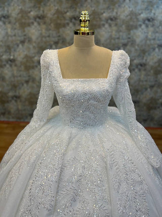 Opulent Square Neck Ball Gown with Intricate Beaded Embroidery and Regal Long Sleeves