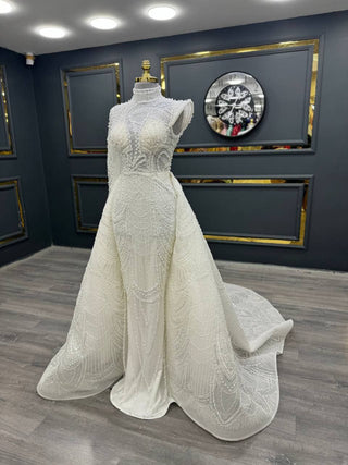 Extravagant High-Neck Beaded Gown with Intricate Embroidery and Dramatic Train