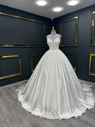 Regal Illusion High-Neck Ball Gown with Intricate Beaded Bodice and Majestic Skirt