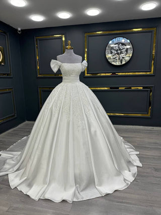 Opulent Off-Shoulder Beaded Ball Gown with Bow Sleeves and Embellished Skirt