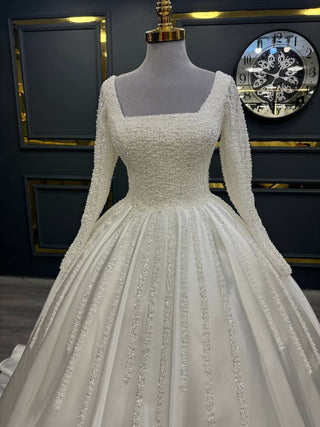 Refined Long-Sleeve Beaded Ball Gown with Square Neckline and Embellished Skirt