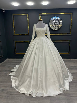 Refined Long-Sleeve Beaded Ball Gown with Square Neckline and Embellished Skirt