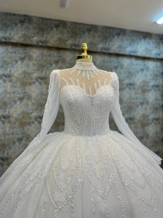 Majestic High-Neck Illusion Beaded Ball Gown with Long Sleeves and Ornate Skirt