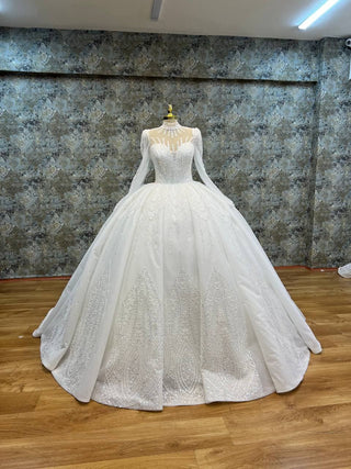 Majestic High-Neck Illusion Beaded Ball Gown with Long Sleeves and Ornate Skirt