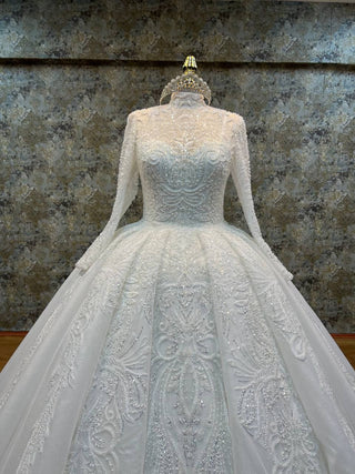 Elegant Long-Sleeve High Neck Beaded Ball Gown with Intricate Embellishments and Luxurious Train