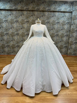 Regal Long-Sleeve High Neck Embellished Ball Gown with Intricate Beading and Grand Train