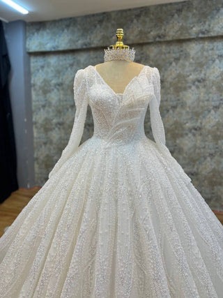 Elegant Long-Sleeve Sweetheart Neckline Beaded Ball Gown with Intricate Embellishments and Grand Train