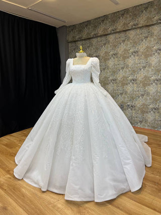 Elegant Long-Sleeve Square Neck Beaded Ball Gown with Intricate Embellishments and Grand Train