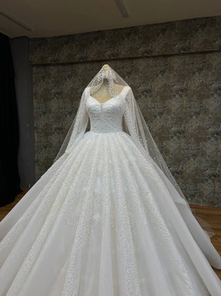 Majestic Long-Sleeve Sweetheart Neckline Beaded Ball Gown with Grand Train