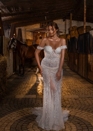 Opulent Off-the-Shoulder Sheer Mermaid Gown with Elaborate Beadwork and Detachable Train