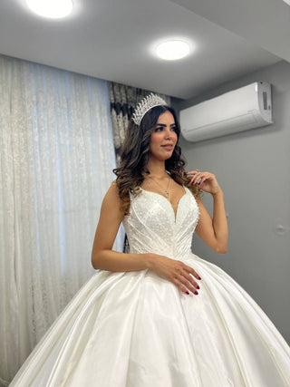 Elegant Sweetheart Neckline Beaded Satin Ball Gown with Sculpted Waist and Regal Train