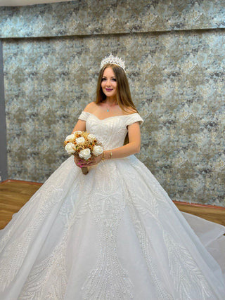 Opulent Off-the-Shoulder Beaded Satin Ball Gown with Intricate Embellishments and Regal Train