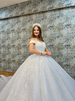 Luxurious Off-the-Shoulder Beaded Satin Ball Gown with Elaborate Embellishments and Majestic Train