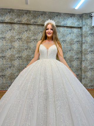 Luxurious Sweetheart Neckline Beaded Satin Ball Gown with Intricate Embellishments and Majestic Train